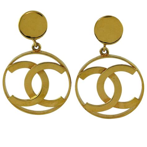 chanel logo gold|gold chanel logo hoop earrings.